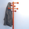 Portemanteau en bois orange Années 70 Portemanteau en bois orange Années 70