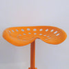 Tabouret Tracteur orange tripode Annees 70 Tabouret Tracteur orange tripode Annees 70