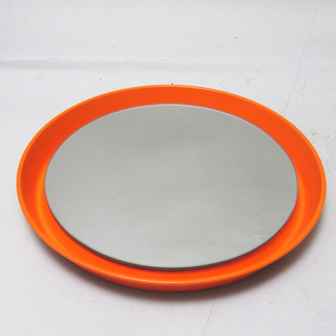 Miroir rond en métal orange circa 70