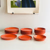 Service d'assiettes orange Années 70 Service d'assiettes orange Années 70