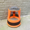 Tabouret-Marche-pied roulant orange Kik Step Années 70 Tabouret-Marche-pied roulant orange Kik Step Années 70