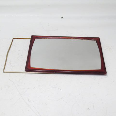 Petit miroir en plastique ambré Annees 80