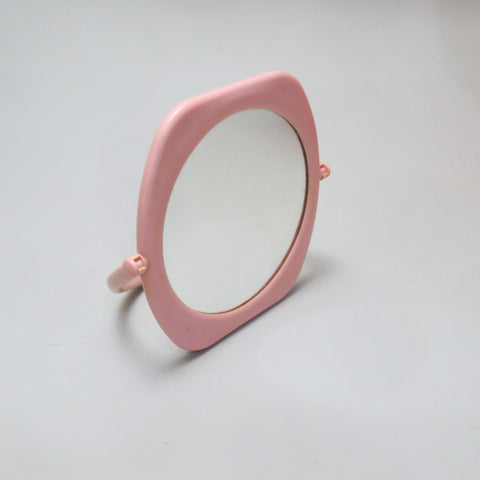 Petit miroir en plastique rose Annees 80