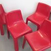 Quatre chaises en fibre de verre rouge années 70