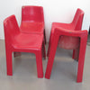 Quatre chaises en fibre de verre rouge années 70