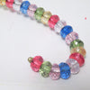 Cintre bijoux à perles multicolores