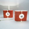 Pair of orange lamps by Stilux
