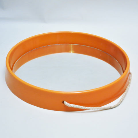 Miroir rond en plastique orange 1970