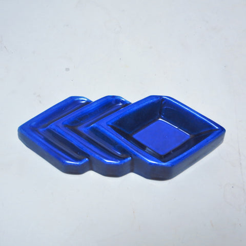 Vide-poche flèche en ceramique bleu 1970